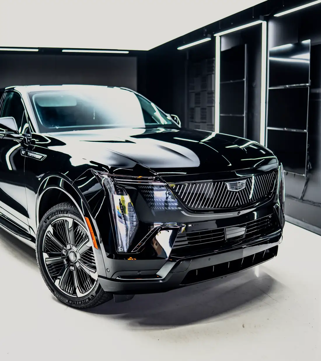 Black Cadillac Escalade IQ from the Hermes Travel fleet