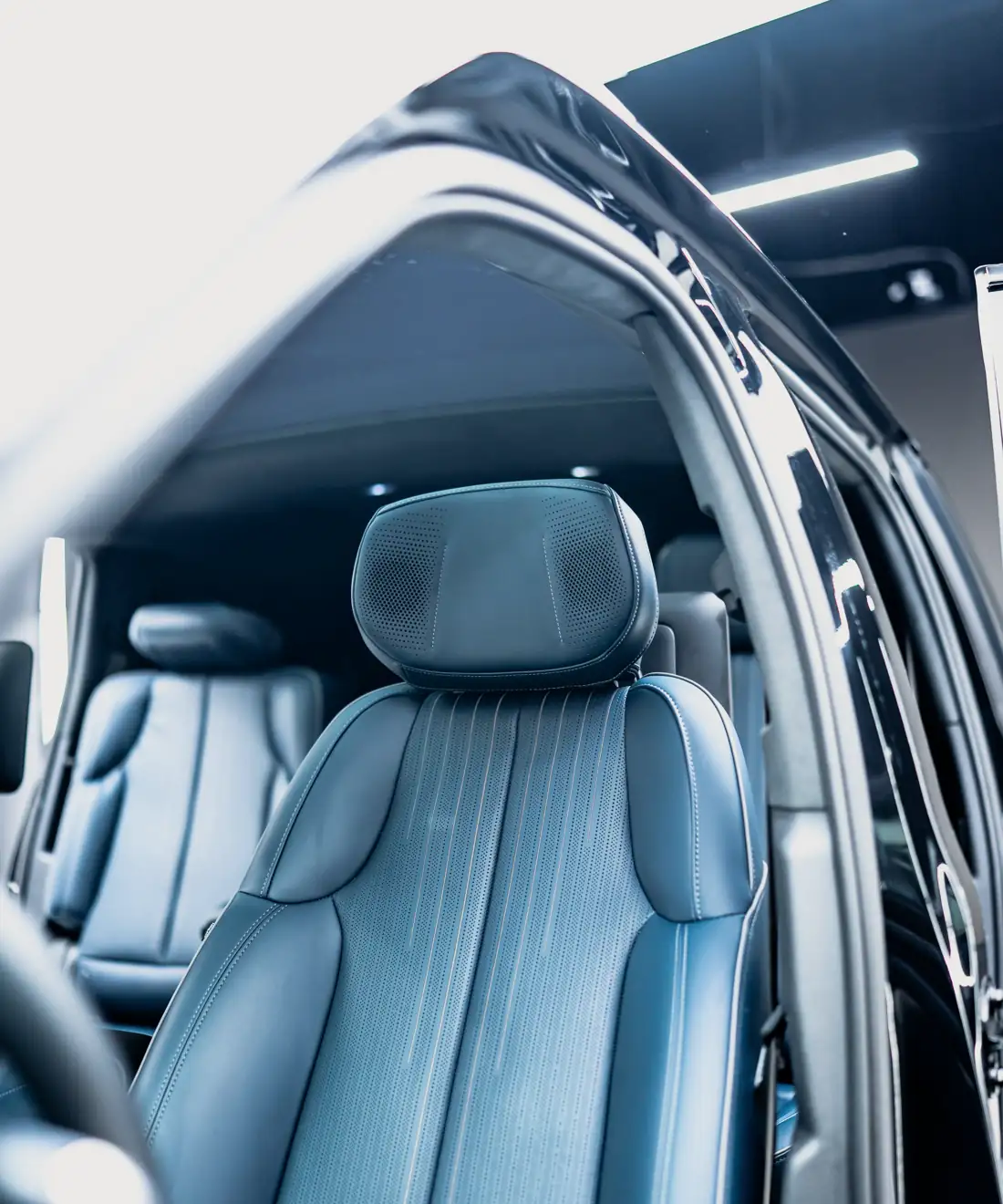 Steel-blue leather second-row captain chair in the Escalade IQ
